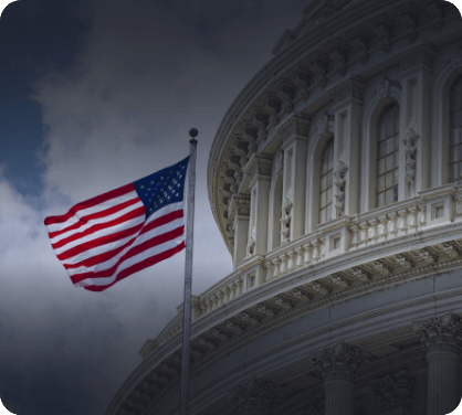 US Flag in Front of State Building